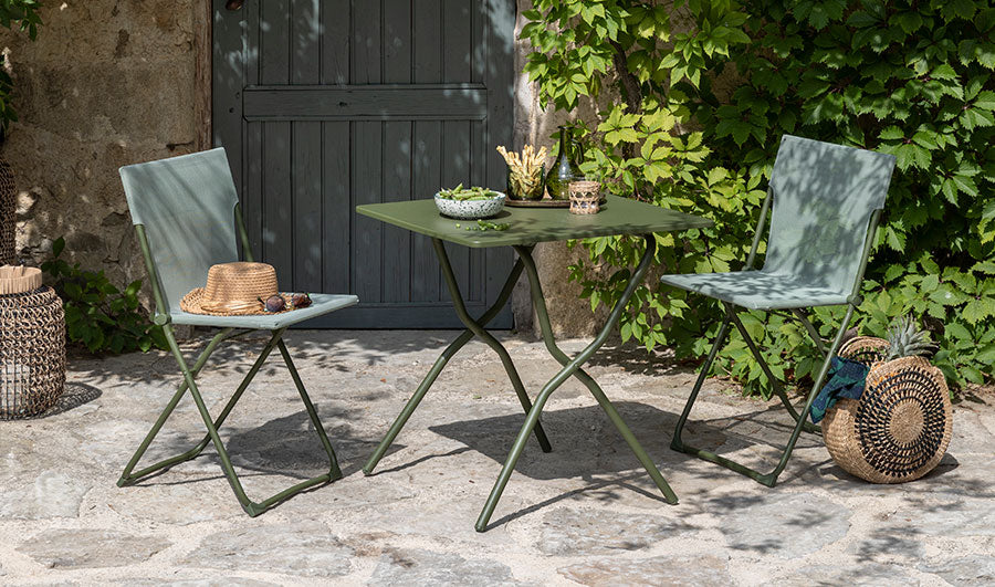 small metal patio table and chairs